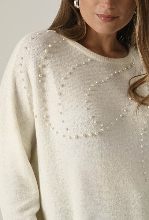 Biały sweter z perłami