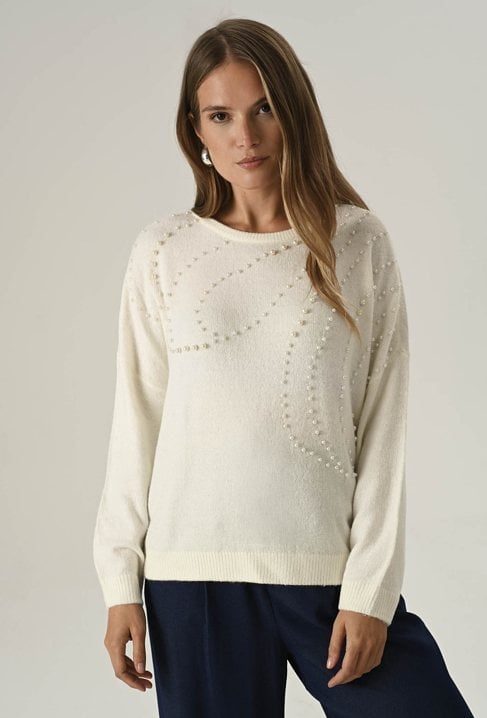 Biały sweter z perłami