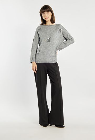 Sweter z cekinowymi kokardkami