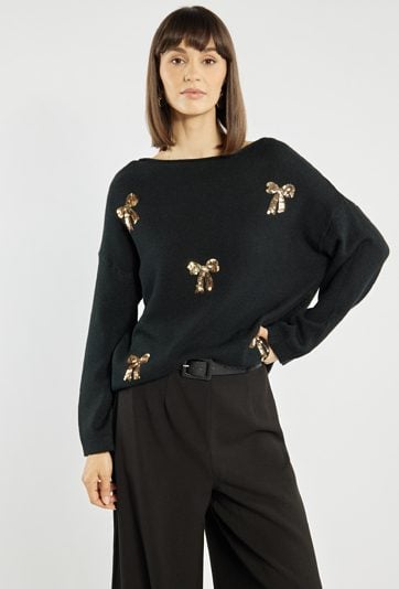 Sweter z cekinowymi kokardkami