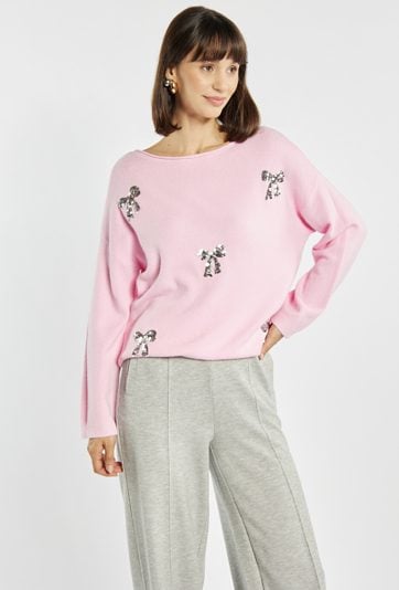 Sweter z cekinowymi kokardkami