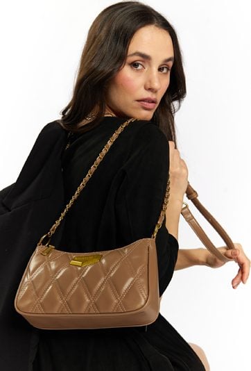 Mała torba damska z ozdobną blaszką