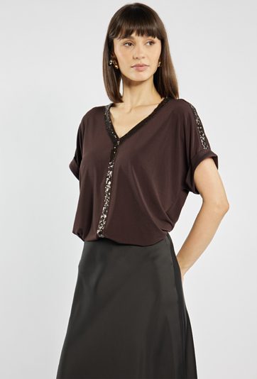 Bluzka z błyszczącymi elementami