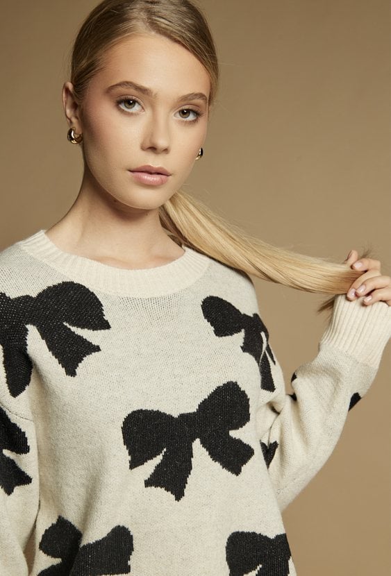 Sweter damski z kokardkami