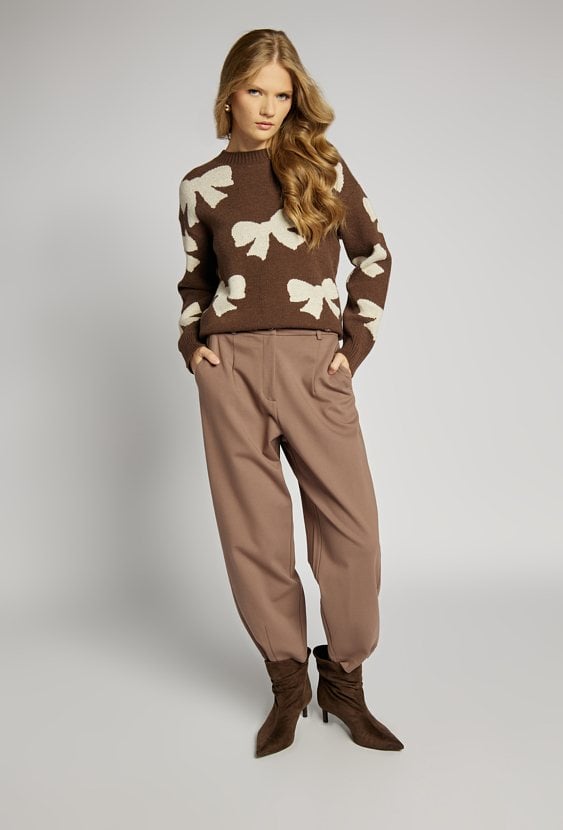 Sweter damski z kokardkami