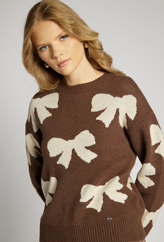 Sweter damski z kokardkami